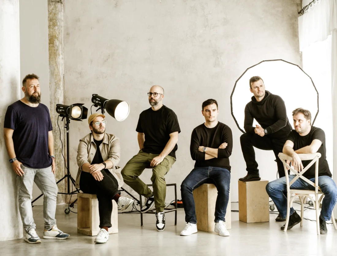 Six members of the Rockstar Academy team in a photography studio