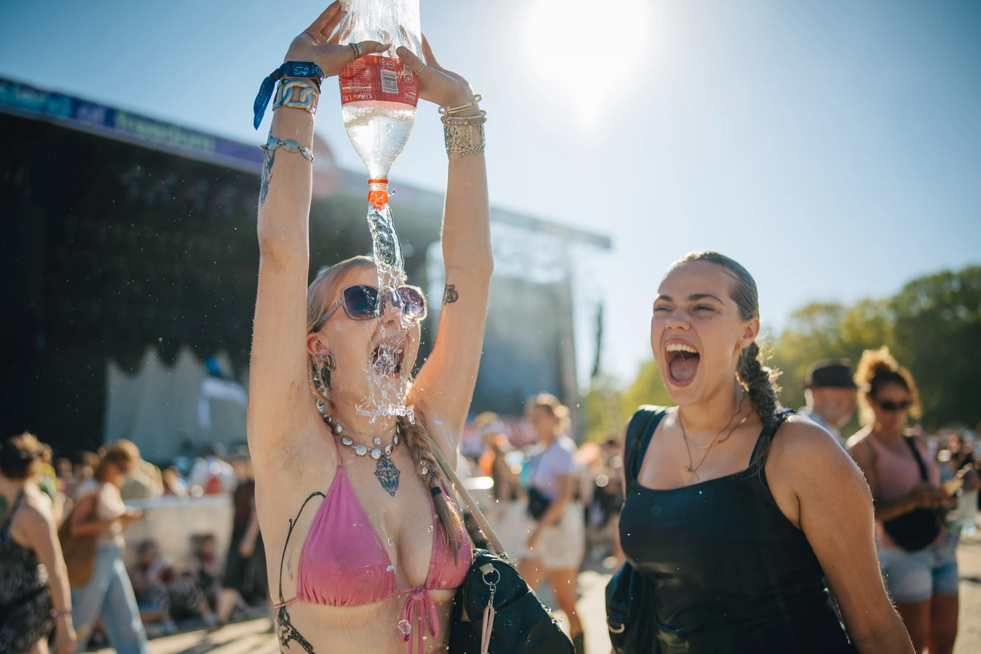 Festivalgoers living in the moment at Sziget, photographed by Márton Koncz